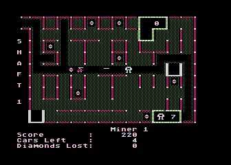 Diamond Mine (Atari 8-bit) screenshot: Shooting a foe, while carrying a diamond