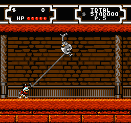 Disney's DuckTales 2 (NES) screenshot: Fighting the D-1000 - that was close