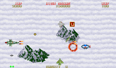 Twin Falcons (Arcade) screenshot: Note lower speed power-up