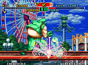 Savage Reign (Neo Geo) screenshot: Gordon starts to strikes back Carol, and thanks to his super move Mad Police, he accurately gets it.