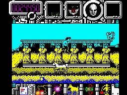 Hysteria (ZX Spectrum) screenshot: Level 1: Protohistory.<br> These gargoyle statues can also show collectible objects when destroyed. The pieces of the jigsaw puzzle were put together but there is still something missing.