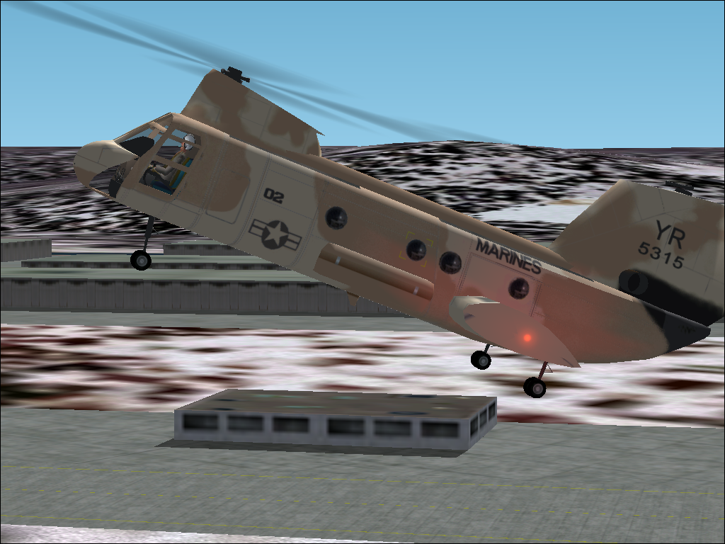 Military Collection (Windows) screenshot: CH-46E - the front lifts before the rear on takeoff in this bird, but now I'm reversing.