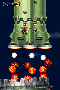 Contra 4 (Nintendo DS) screenshot: Oh, crap! You just know that what's coming up next will drastically deplete your 1-up supply.