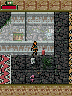 Lara Croft: Tomb Raider - Anniversary (J2ME) screenshot: Picking up explosives