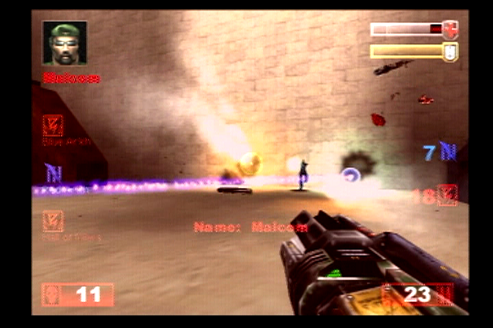 Unreal Tournament (PlayStation 2) screenshot: Looks like Malcom is in some trouble.