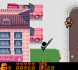 VIP (Game Boy Color) screenshot: Shooting the bad guys while walking as Quick Williams