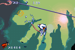 Earthworm Jim (Game Boy Advance) screenshot: Using the whip in mid-air.