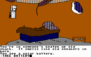The Tracer Sanction (Commodore 64) screenshot: In the hermit's hut, a dumpy place.