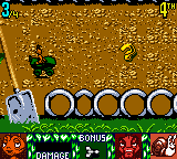 Antz Racing (Game Boy Color) screenshot: You are jumping in the machine. The shovel is much bigger than you are.