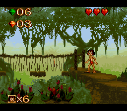 Disney's The Jungle Book (SNES) screenshot: Watch out for plants that shoot thorns.