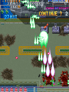DonPachi (Arcade) screenshot: Tanks defend ship