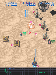 U.N. Defense Force: Earth Joker (Arcade) screenshot: Homing missiles (HOM) and fire power (P) power-ups