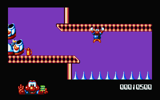 James Pond 2: Codename: RoboCod (Atari ST) screenshot: Climbing across the ceiling to avoid the spikes.