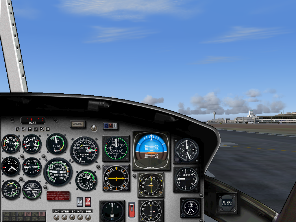 Take to the Skies (Windows) screenshot: UH-1H. 2D cockpit, main panel, pilot seat. (FS2004)