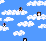 Dancing Furby (Game Boy Color) screenshot: A furby descends from heaven.