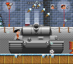 Soccer Kid (SNES) screenshot: How stereotype: a tank on Red Square in Moscow