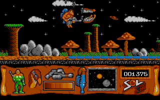 Sol Negro (Atari ST) screenshot: The gun needs charging just as I'm menaced by the chattering teeth.