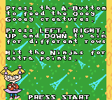 Rugrats in Paris: The Movie (Game Boy Color) screenshot: Instructions for shooting the Ooey-Gooey Creatures and ninjas.