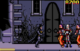 Batman Returns (Lynx) screenshot: Two 90s fashion victims and one dynamite throwing robot