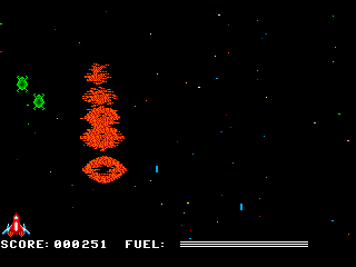 Zenix (TRS-80 CoCo) screenshot: Single enemies leave a long trail behind when shot