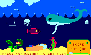 Moby Maths (TRS-80 CoCo) screenshot: Open mouth to eat the right fish