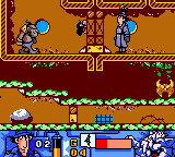Inspector Gadget: Operation Madkactus (Game Boy Color) screenshot: A troll of some sort fires at our hero.
