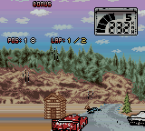 Test Drive: Le Mans (Game Boy Color) screenshot: Log cabins in a new setting.
