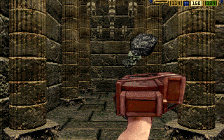 Stonekeep (DOS) screenshot: Get rid of the floating skulls using this ingenious stone-spitting dwarven contraption!