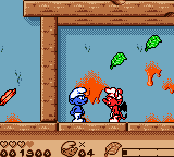 The Smurfs' Nightmare (Game Boy Color) screenshot: Evil smurf (red) on your way