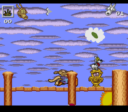 Rocko's Modern Life: Spunky's Dangerous Day (SNES) screenshot: Get Spunky to the hydrant to finish this level