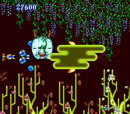 Psychosis (TurboGrafx-16) screenshot: Shooting at a masked devil