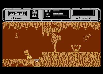 Starquake (Atari 8-bit) screenshot: Walk on to that white pad to fly around instead of walking.