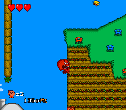 Bonk 3: Bonk's Big Adventure (TurboGrafx-16) screenshot: Bonk climbs with his teeth
