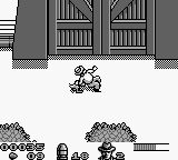 Jurassic Park (Game Boy) screenshot: Getting attacked by a small dino.