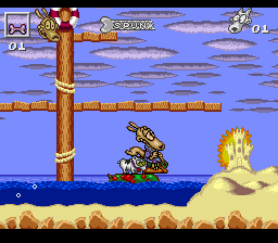 Rocko's Modern Life: Spunky's Dangerous Day (SNES) screenshot: Riding a rubber raft