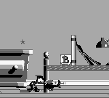 Disney's Toy Story (Game Boy) screenshot: Lassoing a low flying plane.