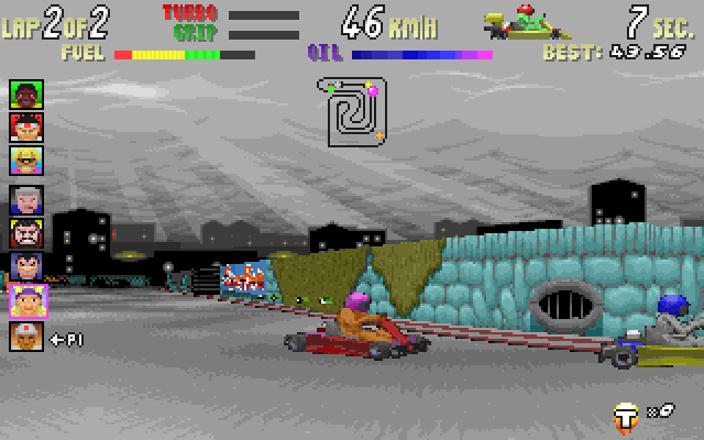 SuperKarts (DOS) screenshot: Checking a racer from a different view. Why's London in the sewers?