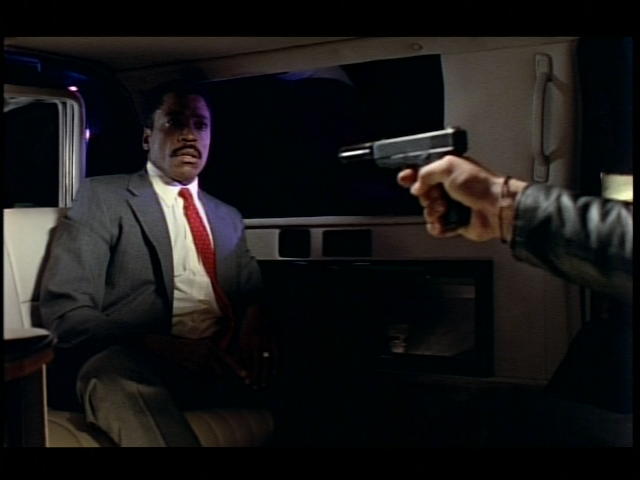 I'm Your Man: Special Edition (DVD Player) screenshot: Richard shooting his companion