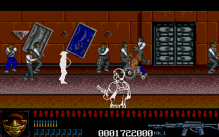 Predator 2 (Atari ST) screenshot: I decide to do some redecorating. Look at that guy in the wheelchair speed out of here!