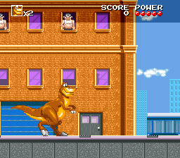 We're Back!: A Dinosaur's Story (SNES) screenshot: Watch out for the guys above dropping objects.