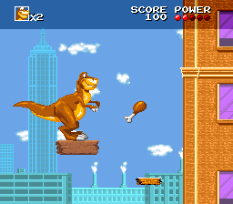 We're Back!: A Dinosaur's Story (SNES) screenshot: Riding a moving platform.