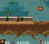 Antz (Game Boy Color) screenshot: DUCK! The bartender is throwing things.