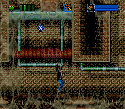 Time Trax (SNES) screenshot: Hanging on some pipes
