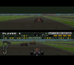 F1 Pole Position (SNES) screenshot: Driving on a wet track