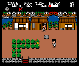 Ganbare Goemon! Karakuri Dōchū (MSX) screenshot: Goemon changes to his white suit, throwing money at enemies