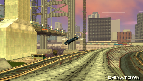 Grand Theft Auto: Liberty City Stories (PSP) screenshot: During a Unique Jump attempt on Portland over the El Train tracks.