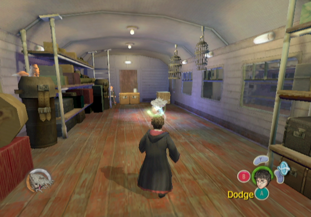 Harry Potter and the Prisoner of Azkaban (GameCube) screenshot: Beginning the game on a train, where spells can be cast on some troublesome books...