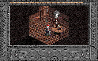 The Immortal (Amiga) screenshot: An image of the old wizard Mordamir leaps from the candle and begins to speak.
