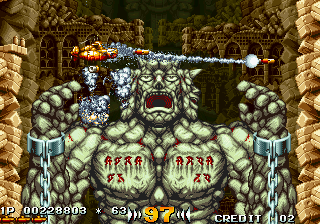 In the Hunt (SEGA Saturn) screenshot: Level 3 is entirely vertical. You are being chased by this rock giant.