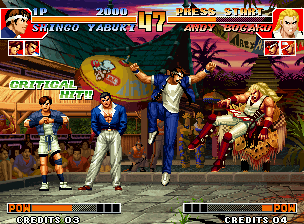 The King of Fighters '97 (Neo Geo) screenshot: Shingo Yabuki executing his move 100 Shiki: Oniyaki Mikansei against Andy Bogard: a "Critical Hit!!"